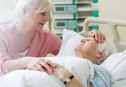what to say to loved ones who are dying end of life care training image of patient being comforted by daughter by project compassion